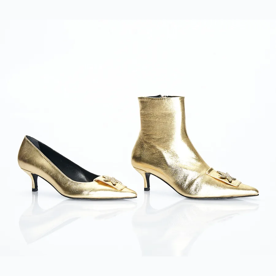MARITZA AW24 catalog — gold metallic leather kitten-heel pump and matching ankle boot, both with a crystal star buckle